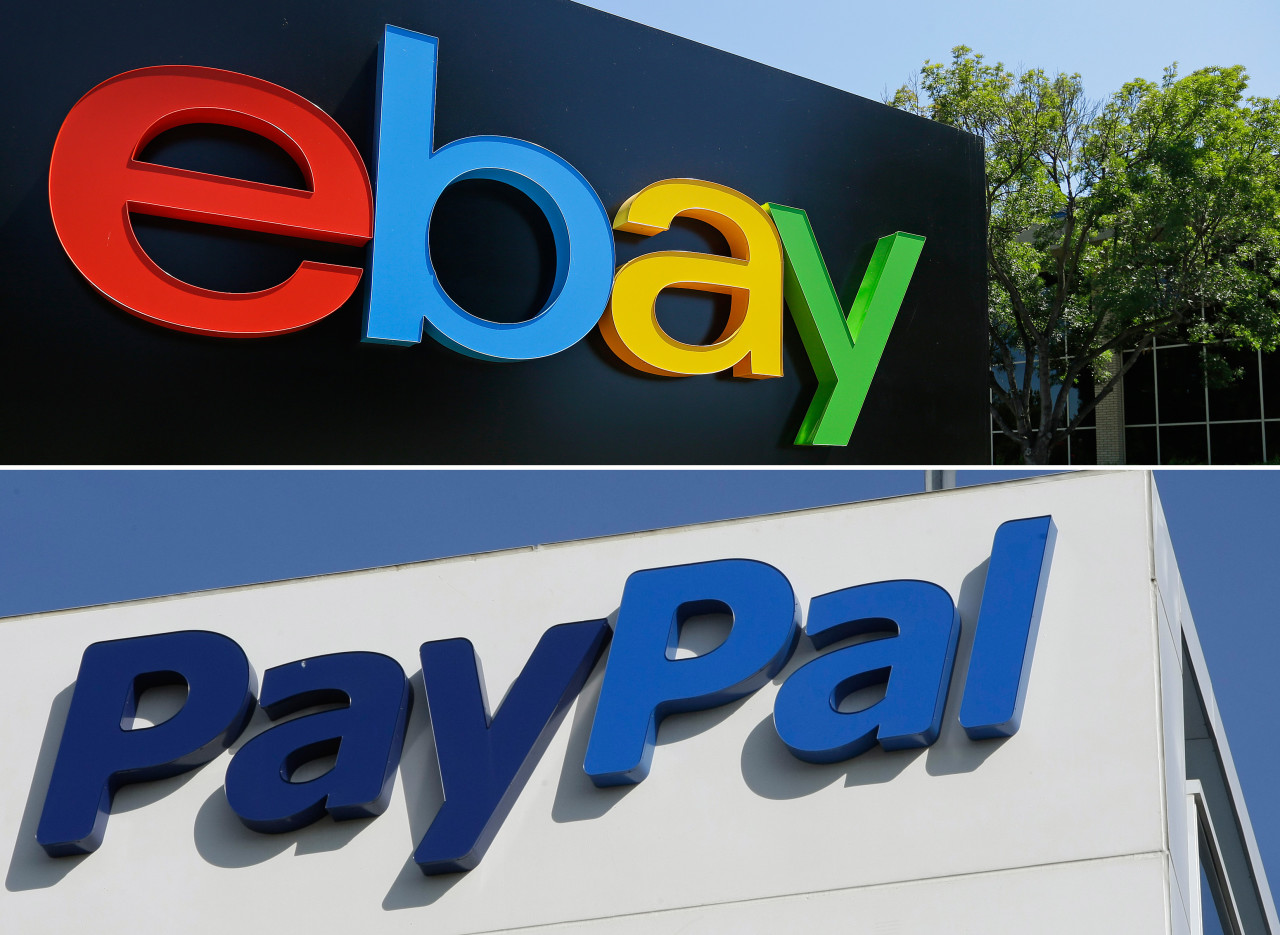 This combo made from file photos shows the eBay, top, and PayPal logos at their headquarters buildings in San Jose, Calif. The mobile payment service PayPal is splitting from eBay and will become a separate and publicly traded company in 2015, eBay announced Tuesday, Sept. 30, 2014. (AP Photo)